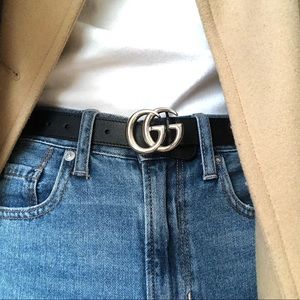 Black children’s Guccis belt with silver buckle